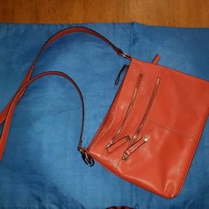 Tignanello orange crossbody "tech purse"